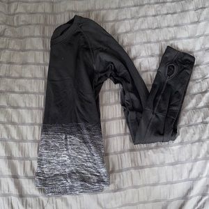 Lululemon black and gray long sleeve, size 0, slightly cropped.